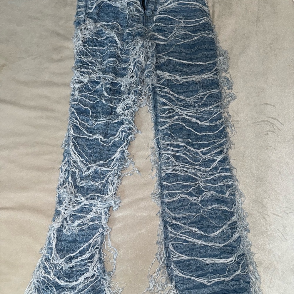 Distressed Blue Flare Jeans